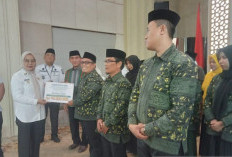 Pemkot Jambi Serahkan Insentif Pegawai Syarak Senilai Rp2,4 Miliar dan Bonus Kafilah MTQ