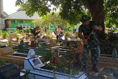 Kodim 0415/Jambi Karya Bhakti Bersihkan TPU Jelang HUT ke-79 TNI