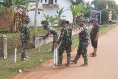 Tim TMMD Gotong Royong Buat Pagar dan Patok, Jelang HUT RI ke 79 Tahun