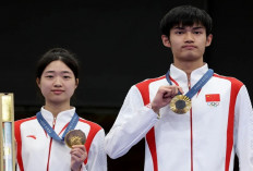 Atlet Menembak China Sheng Lihao dan Huang Yuting Raih Emas Pertama di Olimpiade Paris 2024