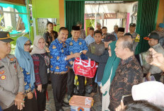 Pj Bupati Kerinci Asraf Serahkan Bantuan 