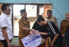 Perkuat Komitmen Perlindungan Sosial, Serahkan Bantuan Bagi Keluarga Pekerja Rentan