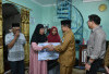 Pastikan Program Perlindungan Sosial Berjalan, Wali Kota Maulana Turun Langsung Serahkan Santunan Kematian